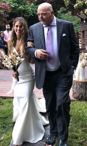 Joanne Rhue Harrison son Rick Harrison walking his daughter down the aisle.